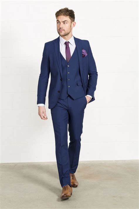 brown shoes navy blue suit.